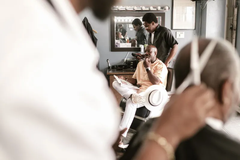 Where the Mirror Holds More Than a Reflection: The Barbershop and Salon as America's Unofficial Civic Square